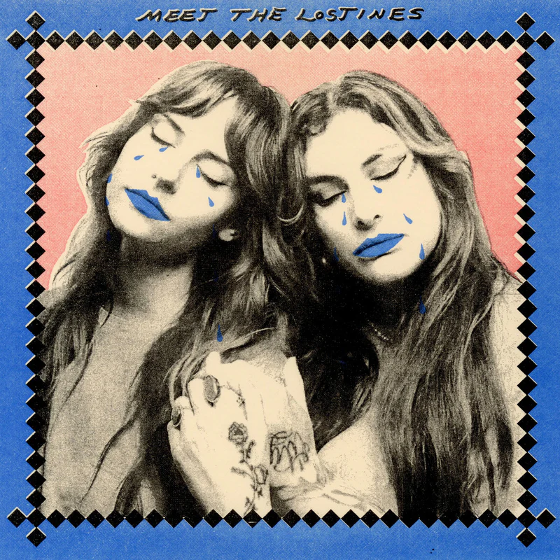 The Lostines framed in the center of the album cover, wearing blue lipstick and gently closed eyes.