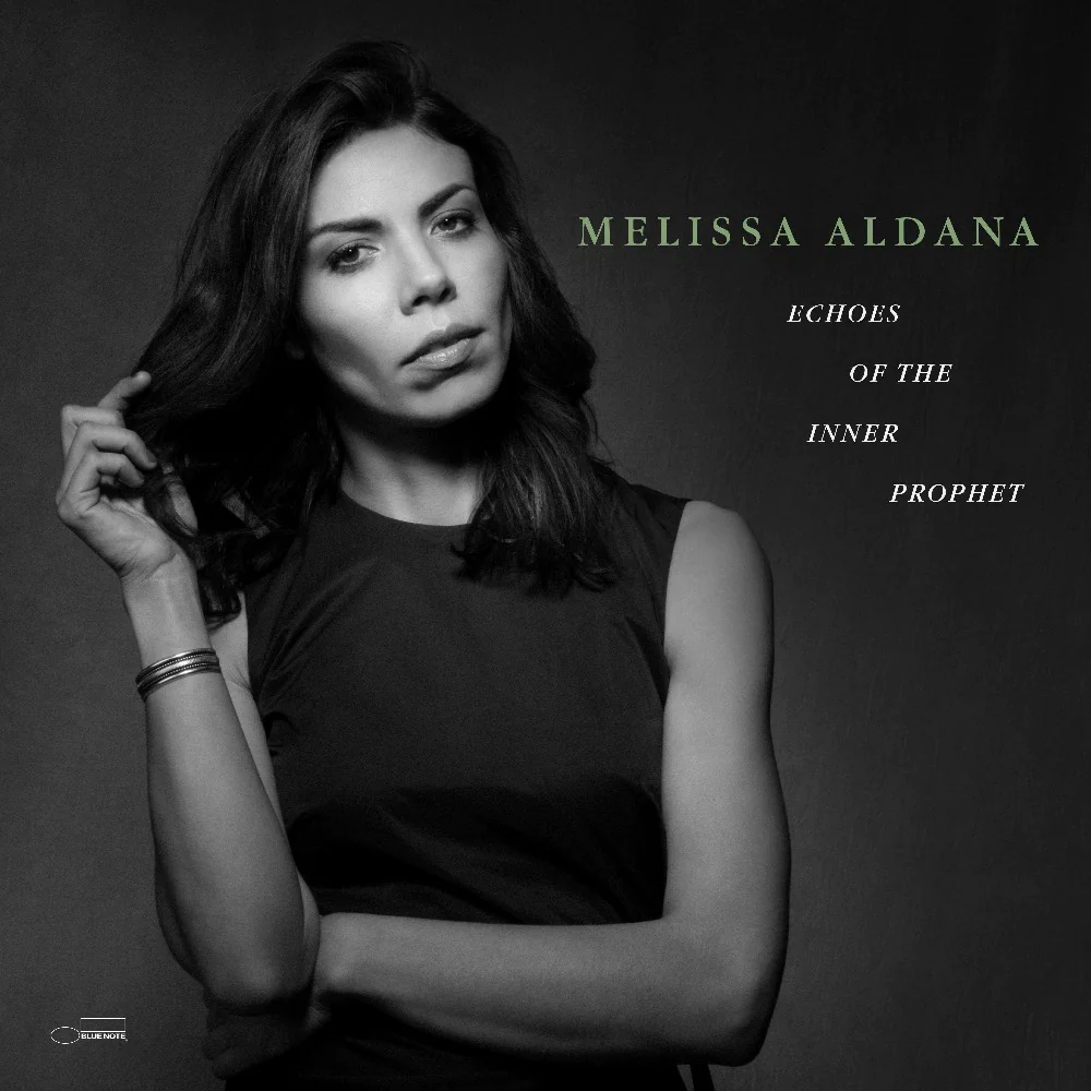 Echoes of the Inner Prophet album cover. Melissa Aldana centered in the frame in black and white, with her name and album title displayed beside her.